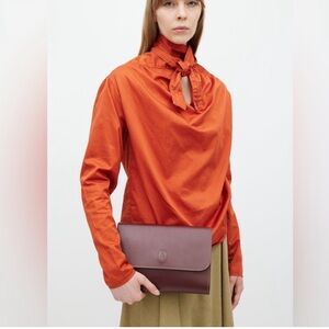 Cartier Must de Cartier Bordeaux Smooth Leather Flap Clutch. B101/11252025